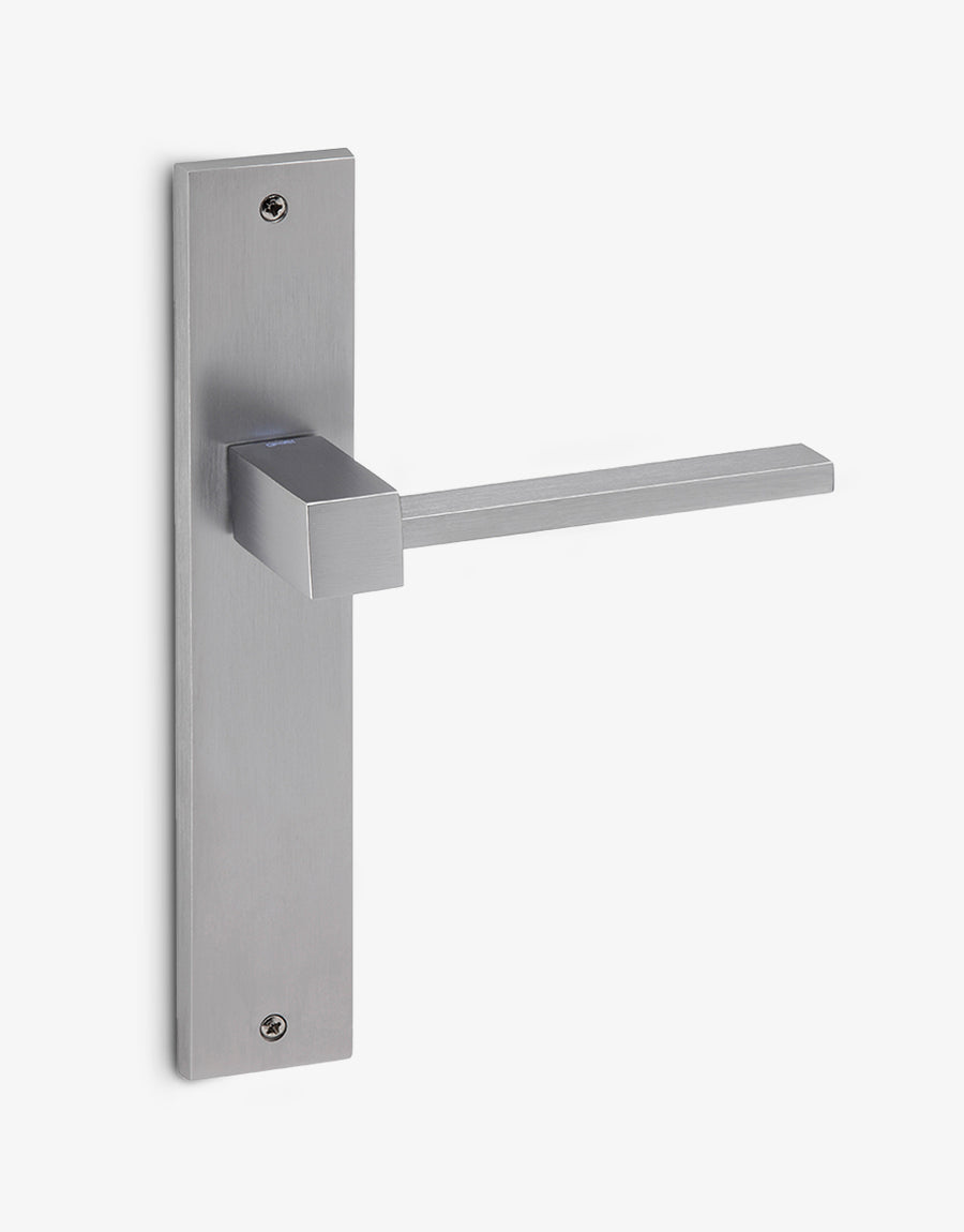 Plano lever handle set on a rectangular backplate